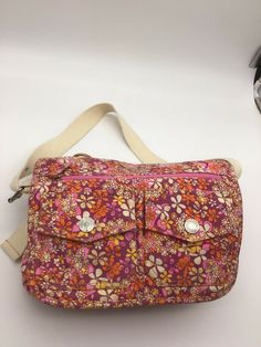 Levi’s PInk Floral Canvas messenger bag/shoulder bag purse VGUC. Cute shoulder bag from Levi’s has snap pockets on the front and zip pockets on the inside. It measures 13” wide x 9.5” tall and 4” Dee; Drop on the adjustable strap is 13” as shown. Orange cotton lining and creme colored webbed strap. Email with questions before you buy…..thanks for visiting my store. Cute Shoulder Bag, Creme Color, Canvas Messenger Bag, Floral Canvas, Bag Shoulder, Pink Floral, Messenger Bag, Duffle Bag, Zip Pockets