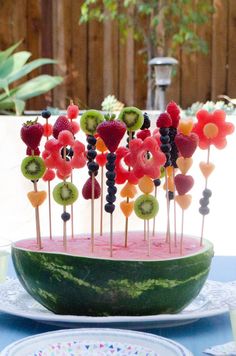 a watermelon platter with fruit on it