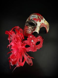 Couple's elegant Venetian masquerade mask set in red. Adorned with red floral feathers, the women's mask exudes a sense of opulence that will leave admirers enchanted. The men's Venetian mask captures the essence of mystery and intrigue. The matching set ensures you and your partner complement each other beautifully, making the night extra special.


Age Group/Gender - Adult/Unisex

Size/Type - One size fits all adults

Mask Color - Red/Gold

Mask Material - Polyresin

Accent Material - Paint

S Red Mask Masquerade, Red Masquerade, Couples Masquerade Masks, Masquerade Theme, Venetian Masquerade Masks, Red Mask, Venetian Masquerade, Female Mask, Elegant Couple