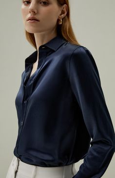 The basic long-sleeve shirt with an open placket is classic, and the proportion of the version is more slim and refined, which is suitable for the workplace that needs a more neat style. 22MM Charmeuse silk Glossy Smooth Soft Basic Shirt Collar Perfect For Work And Leisurewear Regular Fit Long Sleeve Shirt With Button Closure For Business Casual, Elegant Long Sleeve Dress Shirt With Button Closure, Elegant Business Blouse With Placket, Long Sleeve Dress Shirt For Workwear, Timeless Business Top With Concealed Placket, Formal Long Sleeve Shirt With Button Closure, Long Sleeve Dress Shirt With Placket For Work, Timeless Business Top With Fold-down Collar, Timeless Business Top With Fold Down Collar