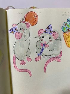 an open book with drawings of mice and cupcakes