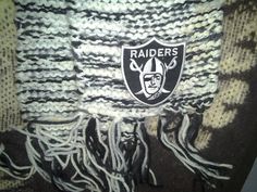 This scarf is made of soft acrylic yarn and is six inches wide and 65 inches long. A tribute to the Oakland Raiders in their colors of black, silver, and white. The patch is an official Raiders patch about two inches tall and wide. Long A, Oakland Raiders, Salt Lake City, Lake City, Acrylic Yarn, Scarf Wrap, Black Silver, Scarf Accessory, Yarn