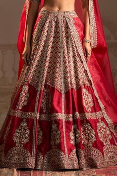 Red can can attached lehenga featuring zardozi embroidered tree, persian floral jaal motifs highlighted by sequins and pearls. Comes with matching embroidered padded blouse and dupatta. - Aza Fashions Festive V-neck Lehenga With Dupatta, Traditional V-neck Set With Sheer Dupatta, Festive V-neck Lehenga For Reception, Diwali Lehenga With Resham Embroidery And V-neck, V-neck Lehenga With Resham Embroidery For Diwali, Anarkali Lehenga With V-neck And Pallu, Diwali V-neck Choli With Dupatta, V-neck Lehenga With Dupatta For Diwali, Red V-neck Navratri Sets