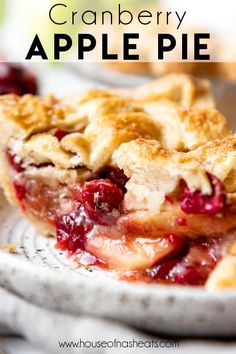 a slice of cranberry apple pie on a plate