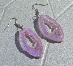 "Beautiful Lavender Pink Hologram Earrings These Faux Geode Earrings Are a Little Bit Transparent-Depending How The Light Hits them. They Are So Pretty! My Photos Do Not Do Them Justice Such a Rainbow When The Light Hits! Earrings Measure About 1 3/4\" x 7/8\" Nice Lightweight Earrings Choose Goldtone or Silvertone Wires at Check Out. Gold Not Pictured Nickle Free Wires Your Earrings Will Arrive In an Organza Bag -Ready For Gift Giving. Made From Epoxy Resin" Trendy Lavender Jewelry For Party, Trendy Purple Drop Earrings, Handmade Trendy Lavender Jewelry, Trendy Handmade Lavender Jewelry, Trendy Lavender Earrings For Gift, Trendy Single Purple Earring, Trendy Hypoallergenic Purple Earrings, Trendy Purple Single Earring, Trendy Purple Round Earrings