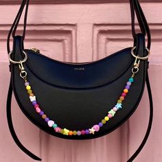 👜 Want to make your handbag unique? 👜 Discover my handmade bag chains from Paris, the perfect accessory to add style and personality to your look. Turn your purse into a jewel with a pop of color! With a practical clasp and ring options, my chains easily attach to almost any bag.  ❣️ First Lodzé bag chain? ❣️ For handles that clasps don't fit, don't forget to select the clip rings 7). * Features: Multicolored bead chain: 36.5 cm - 14.37" (including clasps) *  Customization option: - You can ch Bag Chain Accessories, Beaded Bag Charm, Diy Bag Charm, Diy Bracelet Designs, Beaded Handbag, Bag Chain, Handbag Charms, Beaded Purses, Bead Chain