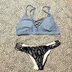 Nwt. Cupshe “Salty Seabreeze Lace Up Bikini Set.” Light Blue Top With Dark Blue Snake Print Bottoms. Pretty Lace Up Front And Adjustable Straps. Size Small Top And Bottom. Crisscross Strap Swimwear For Beach Party, Crisscross Straps Swimwear For Beach Party, Blue Tankini With Straps For Poolside, Blue Strappy Tankini For Vacation, Beachy Swimwear With Straps For Beach Season, Casual Beach Swimwear With Straps, Blue Strappy Swimwear For Sunbathing, Blue Strappy Tankini For Swimming, Blue Swimwear With Crisscross Straps For Pool