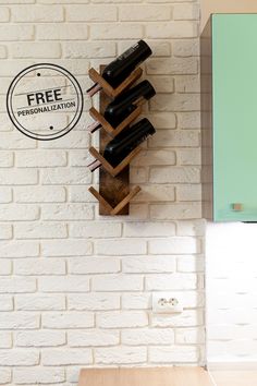 there is a wine rack on the wall