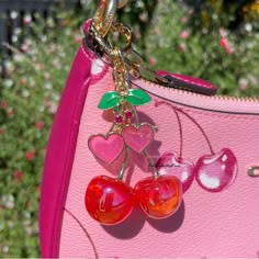 Thank You For Waiting For This Charm!! Newly Improved, As Seen On My Coach Teri Tiktok! You Will Receive (1) Red & Pink Xl Heart Cherry Bag Purse Charm Big Resin Cherry Charm In Red With Rainbow Iridescent Micro Glitter Medium Hot Pink Glitter Resin And Green Leaf Heart Shape Cherry Charm Mini Cherry Charm In Hot Pink & Green Cubic Zirconia Gold Heart Shape Clip With Inlaid Rainbow Crystals Pink Ball Chain To Hang Your Charm Off Any Of Your Bags! Gift Box Approx 3.5” Tall X 1.75” Long Across X 0 Cute Red Bags For Valentine's Day, Cute Red Shoulder Bag For Valentine's Day, Trendy Red Heart-shaped Bag, Y2k Finds, Cherry Stuff, Cherry Purse, Cute Gift Bags, Alt Accessories, Cherry Bag