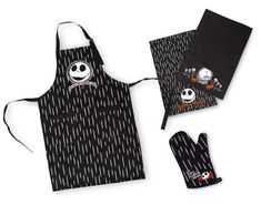 two aprons and one oven mitt are shown with skulls on the front,