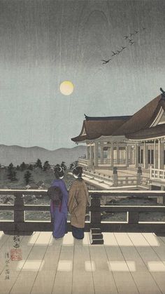 two people are standing on a bridge looking at the moon in the sky above them