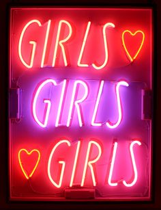 a neon sign that says girls's girls with hearts on the front and back