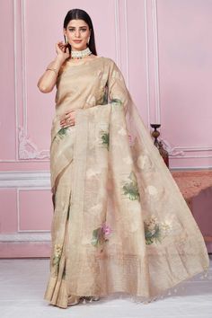 Buy stunning beige floral print Banarasi saree online in USA. Look your best on festive occasions in latest designer sarees, pure silk saris, Kanchipuram silk sarees, handwoven sarees, tussar silk saris, embroidered sarees from Pure Elegance Indian fashion store in USA.-full view Beige Pre-draped Saree With Zari Work, Cream Tissue Silk Saree, Semi-stitched Beige Saree With Zari Work, Beige Zari Work Saree For Diwali, Beige Semi-stitched Saree With Zari Work, Beige Saree With Zari Work For Diwali, Beige Zari Saree For Diwali, Diwali Beige Saree Blouse Piece, Beige Festive Saree With Traditional Drape