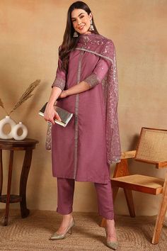 Made with a luxurious silk blend, this mauve pink embroidered straight suit set elevates any outfit. The intricate details adds a touch of elegance, making it perfect for special occasions. The straight cut design flatters all body types, while the lightweight fabric provides comfort and ease of movement. For best results, hand wash and air dry. Size up for a comfortable fit. Straight Suit, Embroidered Suit, Festive Wear, Mauve Pink, Suit Set, Pink Silk, Cut Design, Festival Wear, Straight Cut