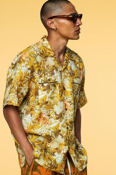 Description Inspired by traditional tapestry florals, our custom Botanical design is offered in short-sleeve in the perfect shade of yellow. Pair it with our Botanical Floral lounge trouser as a matching set or mix it with our pairing recommendations. Yellow Short Sleeve Camp Shirt For Spring, Yellow Hawaiian Shirt With Camp Collar For Spring, Yellow Camp Collar Hawaiian Shirt For Spring, Yellow Cotton Hawaiian Shirt With Floral Print, Yellow Floral Print Hawaiian Shirt For Summer, Yellow Floral Print Top With Camp Collar, Yellow Hawaiian Camp Shirt With Camp Collar, Yellow Relaxed Fit Short Sleeve Camp Shirt, Yellow Floral Print Tropical Tops