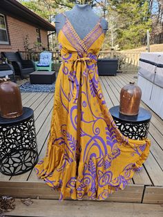 "This is a beautiful empire waist maxi dress , one of a kind handcrafted from vintage silk . Has a V neck , adjustable straps and smocked at the back . Measurement (appx): Bust:  36 \" with elastic waist stretch upto 42\" Height: 56 \"( measured from the shoulder line to the bottom ) ONE size fits most from S to L ,please refer to the measurements before purchasing . Has a tie by the bust for a chic look . Thank you looking , stay safe !" Bohemian Maxi Dress With Smocked Bodice For Casual Wear, Bohemian Halter Neck Maxi Dress With Tie Back, Bohemian Floor-length Maxi Dress With Tie Back, V-neck Sundress With Smocked Bodice, Flowy Lined Maxi Sundress, Bohemian Maxi Dress With Smocked Back For Summer, Bohemian Maxi Dress With Tie Back, Bohemian Maxi Length Lined Sundress, Bohemian Maxi Dress With Smocked Bodice For Vacation