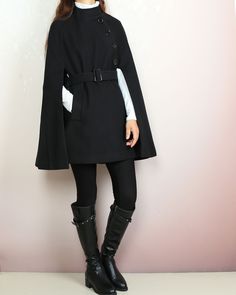 * A cool and long woolen cape coat, very elegant. * With black buttons and fully lined with lining. * Material: 50% wool, 50% polyester. Shop sizing chart FYI ( actual body figures, not laying flat clothes measurements) Size XS (US 2, UK 6, German 32, French 34) Bust: fits bust around 33.5 inches/85cm Waist: fits waist around 26 inches/66cm Hips: fits hips around 36 inches/91cm Size S (US 6, UK 10, German 36, French 38) Bust: fits bust around 35.5 inches/90cm Waist: fits waist around 28 inches/7 Black Cape Poncho For Work, Black Workwear Poncho Cape, Black Workwear Cape, Black Wool Poncho For Winter, Black Wool Poncho For Fall, Wool Black Poncho For Fall, Black Wool Cape Poncho, Black Cape With Cape Sleeves For Work, Elegant Fall Cape For Cold Weather