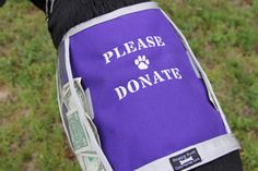 a purple and white bag with the words please donation written on it