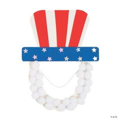 a red, white and blue hat with beads around it's neck on a white background