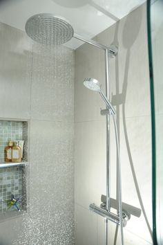 the shower head is connected to the wall