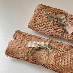 two pieces of wicker wrapped in twine