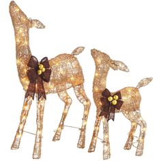 two lighted deer figurines with bows on them