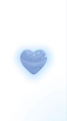 a blue heart shaped object on a white background