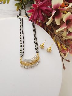 Add charm and charisma to your beautiful personality with these beautifully designed and handcrafted necklaces. Red Climbing Roses, Beautiful Personality, Gold Mangalsutra Designs, Gold Chain Design, Gold Mangalsutra, Mangalsutra Designs, Black Bead Necklace, Climbing Roses, Chain Design