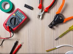 an assortment of electrical wires and tools on a table with the words, affordable electricians nosa