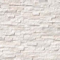 a white brick wall is shown in this image