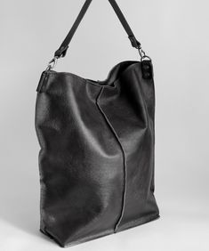 Black Hobo Bag With Leather Lining, Black Leather Lining Hobo Tote Bag, Black Leather-lined Tote Hobo Bag, Black Leather Lined Hobo Tote Bag, Leather Hobo Tote Bag For Business, Black Leather-lined Hobo Bag In Tote Shape, Daily Leather Hobo Bag With Leather Lining, Black Leather Hobo Shoulder Bag, Black Textured Leather Rectangular Hobo Bag