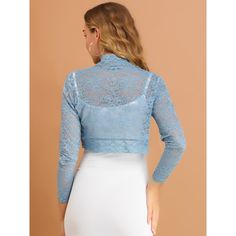 It's designed with floral lace and an open front for a comfortable fit. Crafted from soft and knit fabric, this lace cardigan features feminine full sleeves, and a scalloped hem, and is perfectly covered up with sleeveless dresses for a wedding look. A must-have item in your clothing wardrobe, the lace bolero has long sleeves, and semi-sheer lace, and is finished with a cropped length and could be stretchy a bit. Fitted Lace Cardigan For Party, Fitted Lace Trim Cardigan For Layering, Fitted Lace Cardigan With Crochet Lace, Fitted Lace Cardigan With Crochet Details, Lace Patchwork Cardigan, Long Sleeve Lace Shrug With Lace Trim, Long Sleeve Lace Cardigan With Lace Patchwork, Long Sleeve Lace Trim Cardigan, Long Sleeve Lace Cardigan With Lace Trim