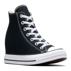 Classic Chucks get an elevated update. An interior wedge ups the height without losing sight of iconic All Star style. Click this FOOTWEAR GUIDE to find the perfect fit and more! Classic Chucks get an elevated update. An interior wedge ups the height without losing sight of iconic All Star style. Click this FOOTWEAR GUIDE to find the perfect fit and more! FEATURES Durable canvas upper with that classic Chucks look and feel A hidden wedge adds height without the bulk OrthoLite cushioning helps pr All Star Style, Womens Wedge Sneakers, Star Style, Wedge Sneakers, Converse Chuck Taylor All Star, Womens Wedges, Shoe Size Chart, Chuck Taylor All Star, Converse Chuck