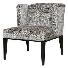 a leopard print chair with black legs