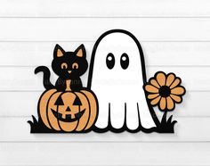 a black cat sitting on top of a pumpkin next to a ghost with a flower