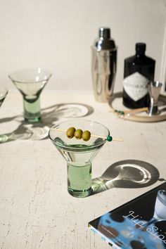 Green. Recycled Glass. Handblown. Made in: Colombia Brand: Kalalou Stemless Martini Glasses, Fine Dining Plating, Entertaining Kitchen, Battery Operated Candles, Prop Styling, Glassware Collection, Candle Accessories, Cocktail Glass, Lantern Candle Holders