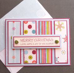 a christmas card with colorful stripes and dots on it, featuring the words merry christmas love life & joy to you always