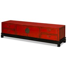 a red cabinet with two drawers on top