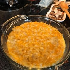 a casserole dish is sitting on the kitchen counter ready to be cooked and eaten