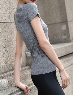 Stretchy, soft sport workout top. Large fits as a medium 92% Nylon, 8% Spandex Breathable Fitted T-shirt For Workout, Casual Sports T-shirt With Snug Fit, Fitted Gray T-shirt For Sports, High Stretch Athleisure T-shirt For Workout, Fitted Breathable T-shirt For Athleisure, Fitted Athleisure T-shirt For Training, Sporty Athletic Fit T-shirt For Light Exercise, Fitted T-shirt For Workout, Gray Fitted Moisture-wicking Activewear