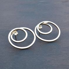 These Modern and Classic Stud Earrings are made of 925 sterling silver, They are simple and stylish. These Geometric Spiral Hoop Earrings are handmade. They are lightweight so It won't even feel like you're wearing earrings, but you'll still standout. a Push Back Closer is soldered at the top of each Spiral Circle. Stuff Type: Spiral Hoop Studs Earrings Metal : 925 Sterling silver Benefits of silver: According to study, wearing silver has helped in balancing moods and increasing energy levels. T Simple Silver Round Earrings, Simple Sterling Silver Earrings As Gift, Sterling Silver Open Circle Earrings For Anniversary, Sterling Silver Simple Design Earrings For Gift, Minimalist Circle Earrings For Anniversary, Sterling Silver Circle Earrings For Anniversary, Modern Circular Hoop Earrings For Anniversary, Modern Hoop Earrings For Anniversary, Modern Circle Hoop Earrings For Anniversary