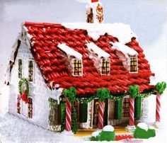 a christmas house is decorated with candy canes