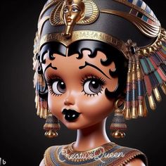 a close up of a doll wearing an egyptian headdress and gold jewelry on it's face