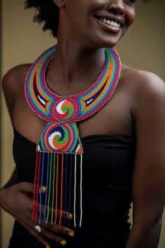 Unique Africa Maasai Handcrafted Leather Beaded Necklace with an Elegant Look and Brilliant Finish. Color = Multi-Color. Length (Around Neck) =Adjustable. Length ( Downwards ) = 14 Inches / 37 Centimeters. **GET FREE SHIPPING FOR ADDITIONAL ITEMS PURCHASED. Yes, Buy Multiple Items and pay shipping for 1 item only- The rest ships Free. (No Limits on the number of Multiple items). With a faster delivery time of 3 days via DHLExpress, Worldwide. Ordinary/Standard Shipping also available upon reques Artisan Multicolor Jewelry With Black Beads, Traditional Rainbow Round Bead Jewelry, African Beaded Necklace, Leather Beaded Necklace, African Beads Necklace, Unique Statement Necklace, African Accessories, Multi Coloured Necklaces, Necklace Leather