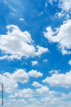 the sky is filled with white clouds and blue water