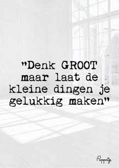 an empty room with the words denk groot mar lat de kliene dingen je gelukking maken