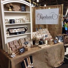 a table that has some items on top of it and is covered in burlap