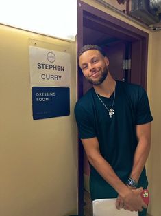 a man standing in front of a doorway