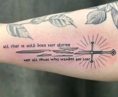 a person with a tattoo on their arm that says, all that is gold does not glitter