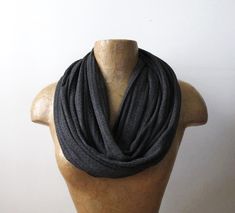 This Soot Gray Infinity Scarf comes in a lightweight waffle knit that breaths easy for all day wear. Sewn with a double layer and finished with a perfectly clean (and invisible) blind stitch.  The Details: - Length - approximately 64" round - Width - approximately 13"  - Color - Soot Gray  - Material - Waffle knit - Hand wash cold, hang dry Please Note:  Color accuracy is very important to me. While what's displayed on my screen accurately matches the fabric, colors may vary slightly due to vari Cleaning Blinds, Blind Stitch, Loop Scarf, Knit Infinity Scarf, Circle Scarf, Lightweight Sweater, Sweater Knit, Light Weight Sweater, Waffle Knit